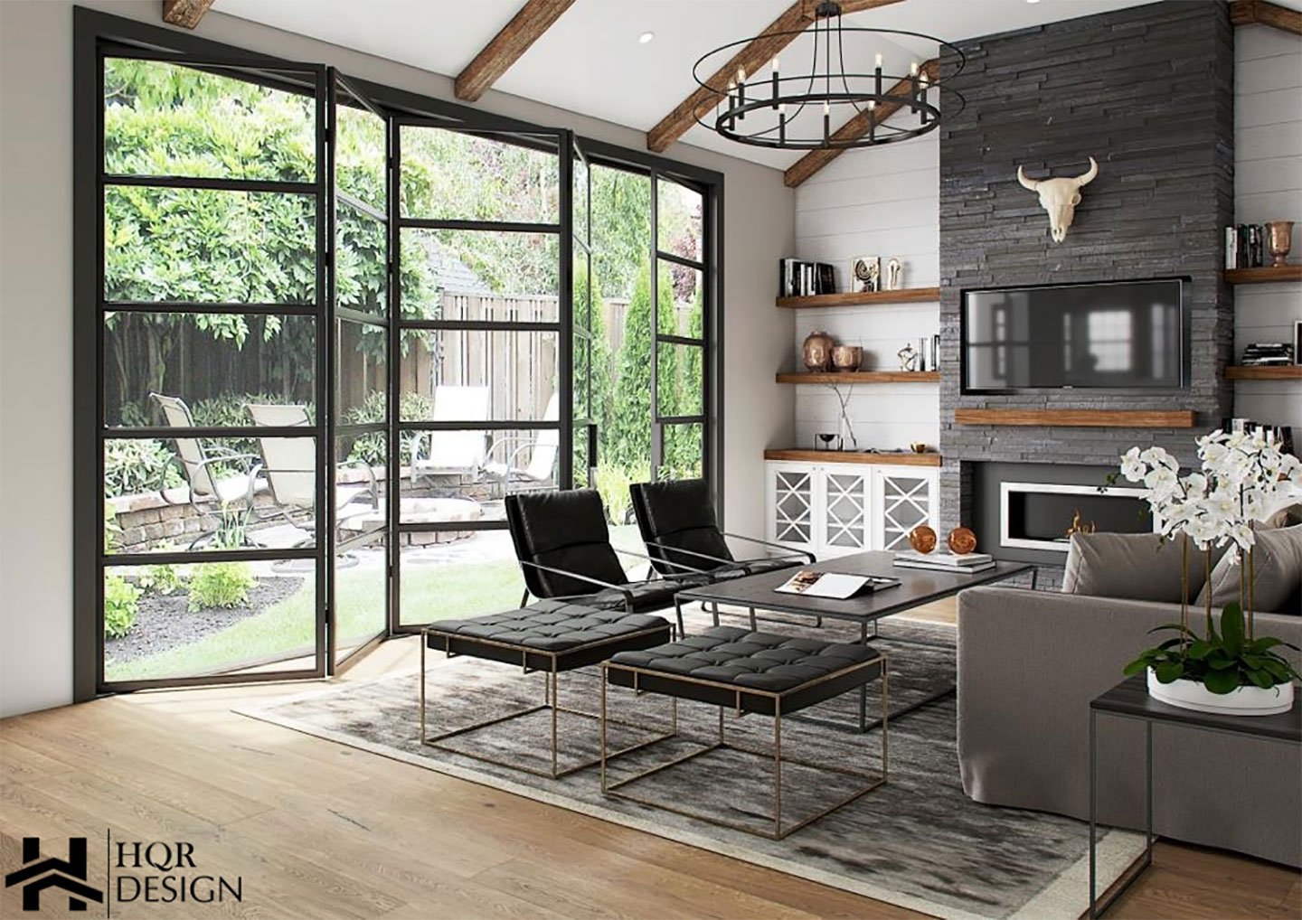 An open concept living room with large windows and sliding glass doors, featuring modern furniture and decor, showcasing a cozy and contemporary interior design.